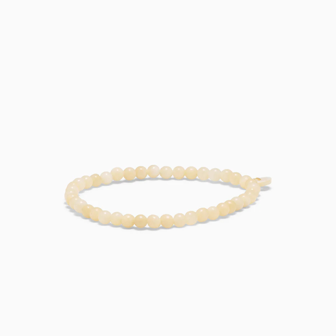 SOÏ - KRYSTAL ARMBÅND - GUL JADE 4 MM.